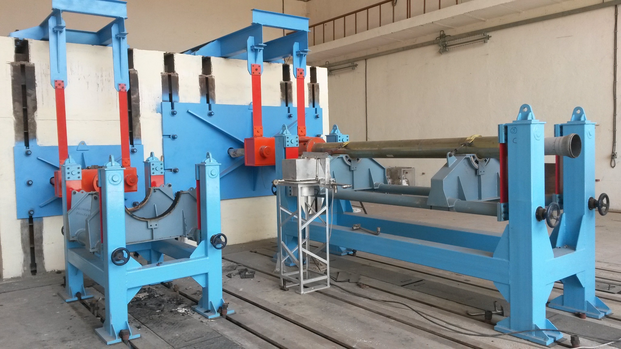 Multi-axis static test bed in a manufacturing facility
